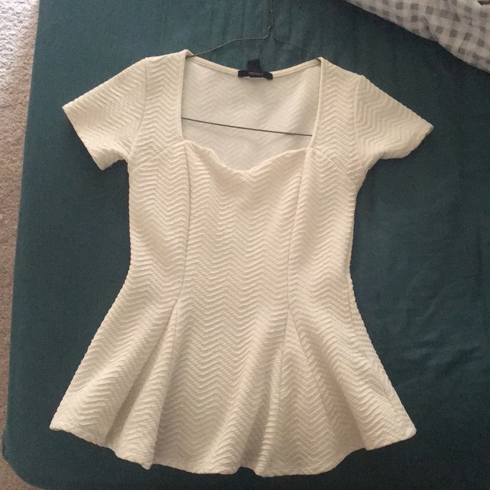 Peplum style cream top